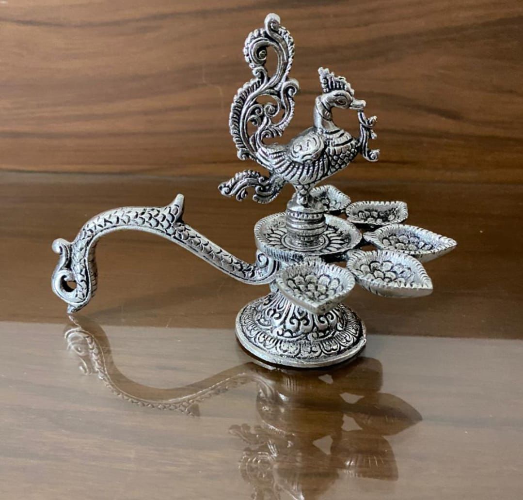 German Silver Handheld Panchamukhi Peacock Diya