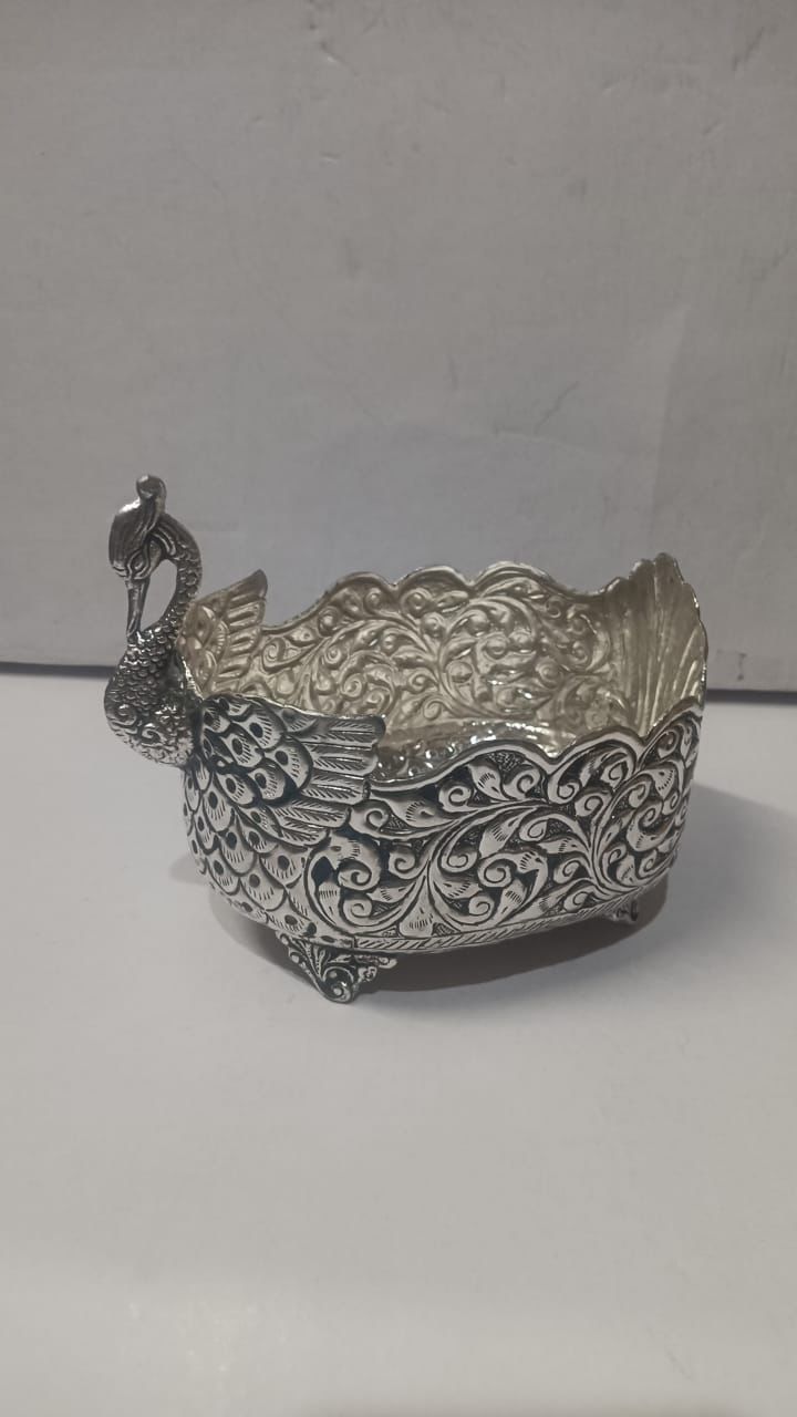German Silver Seated Ganesha Idol under Antique Peacock Arch