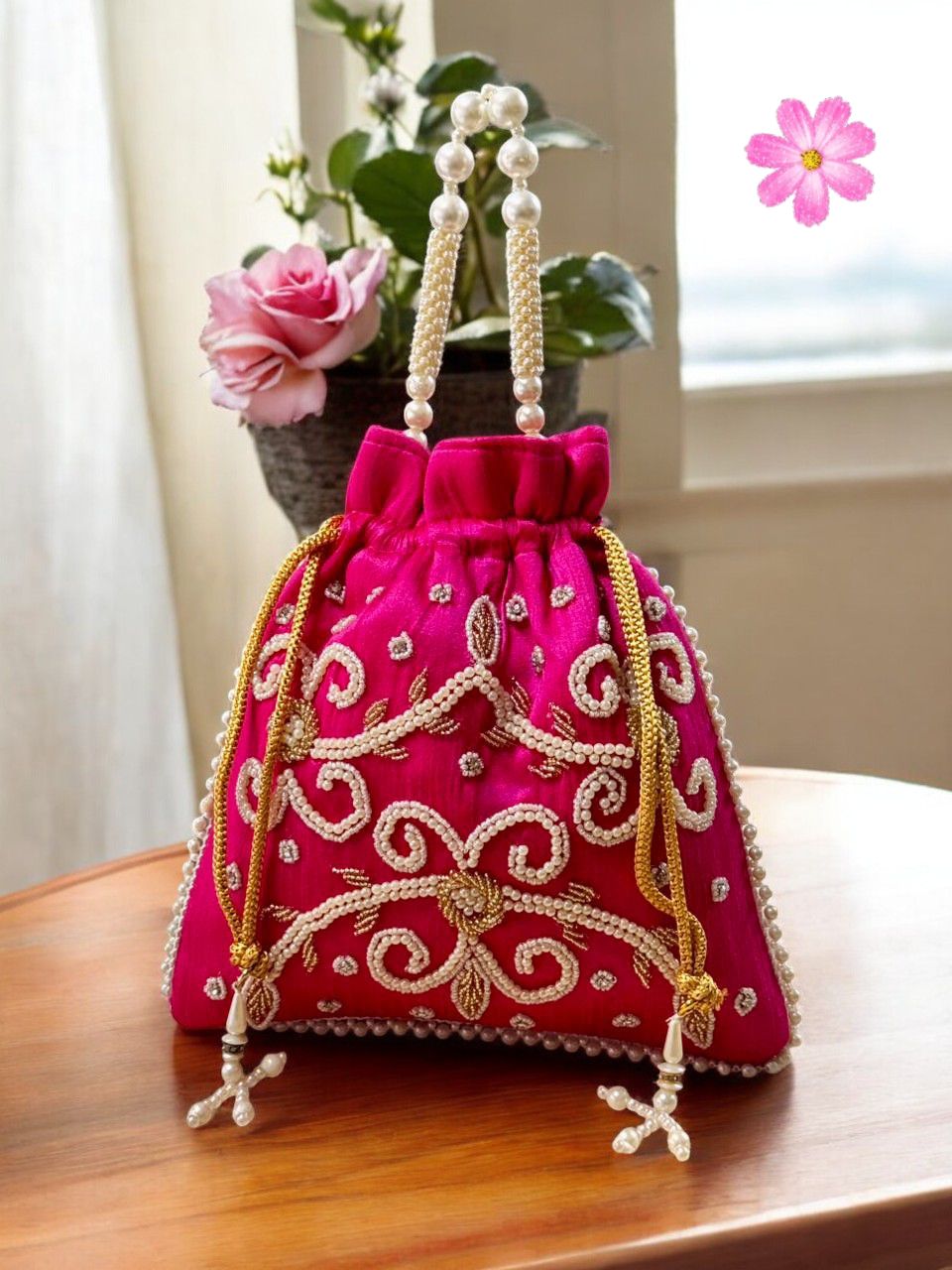 Rani Pink Silk Potli Bag with Intricate Pearl Work