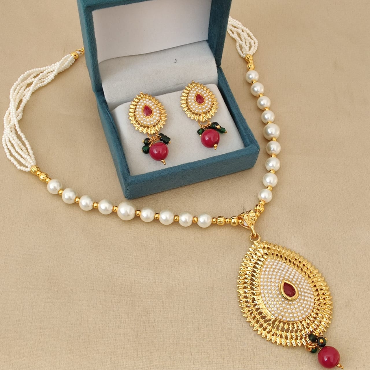 Gold Plated Pearl Pendant Set – Ruby Stone & Sunburst Design